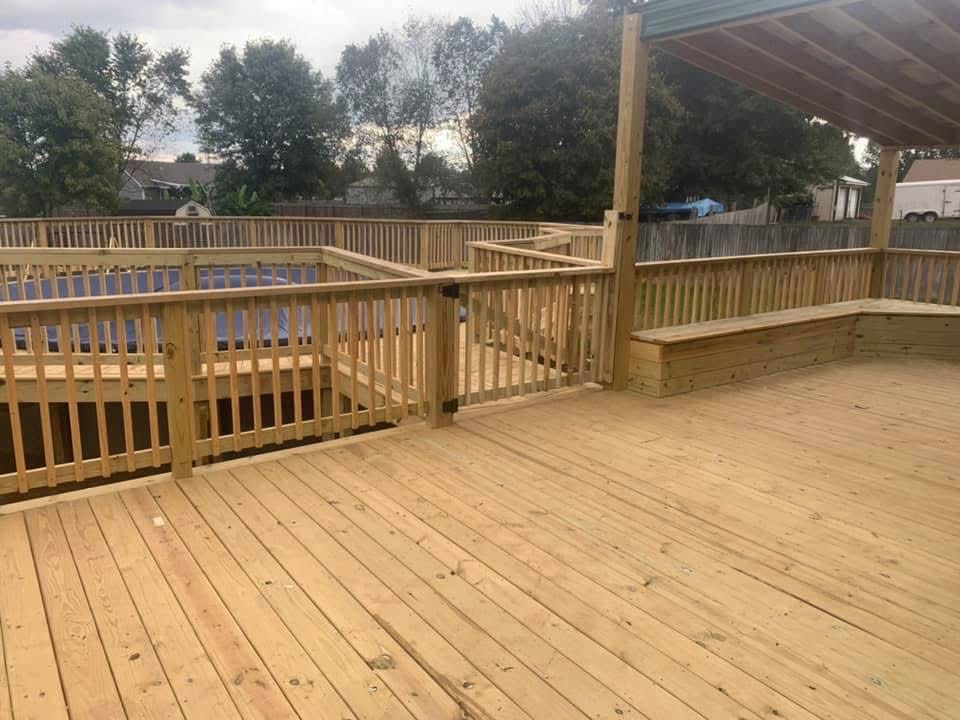 Custom covered deck by Elite Fence & Deck